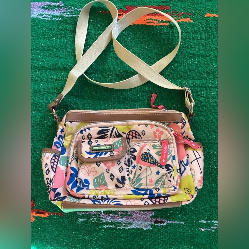 Lily Bloom 5 pocket adjustable strap purse
Width 10”
Depth 8”
Strap 21”